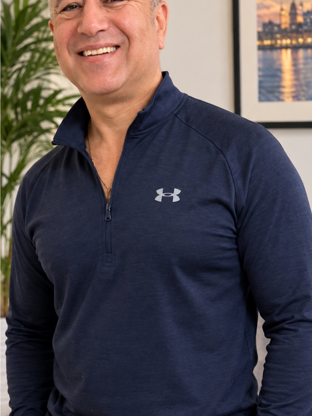 Under armour


 Navy Half-Zip Pullover with Chest Logo
